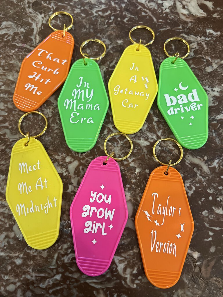 BAD DRIVER HOTEL KEYCHAIN