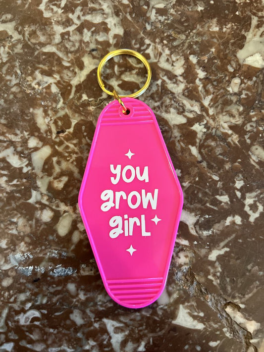 YOU GROW GIRL HOTEL KEYCHAIN