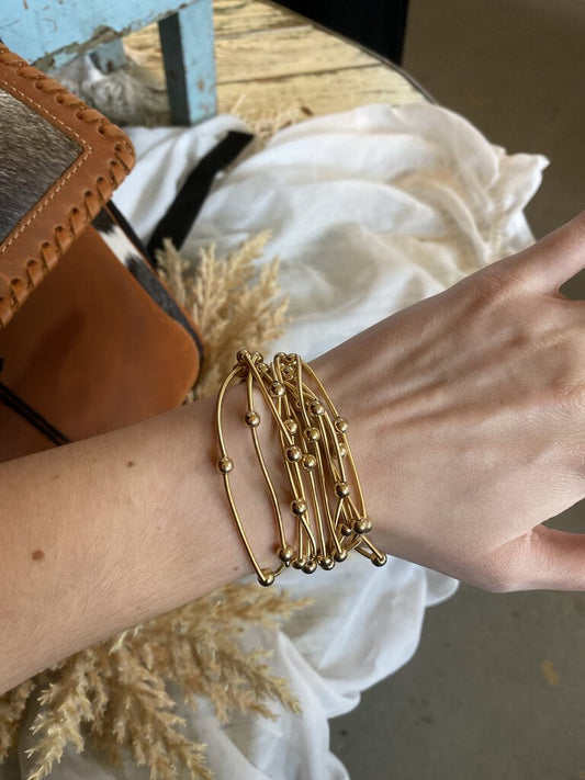 SET OF SIMPLE GOLD BANGLES